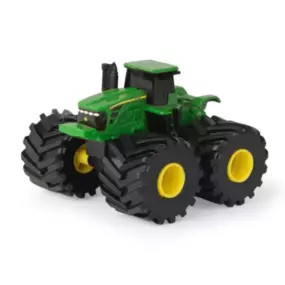 John Deere Monster Treads muddy tractor